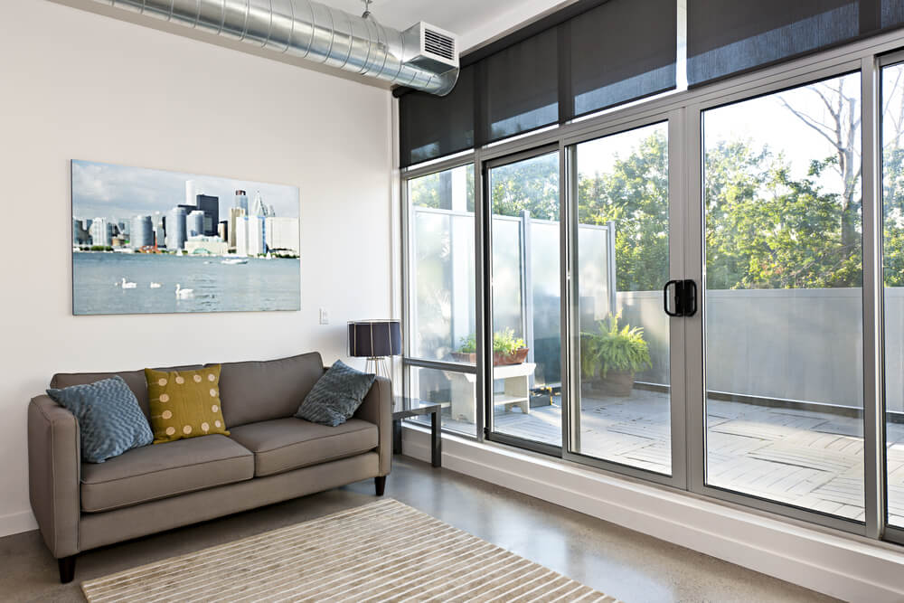 Living room with sliding glass door to balcony.